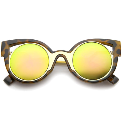Sunglasses cat-eye style with gold frame and green lenses